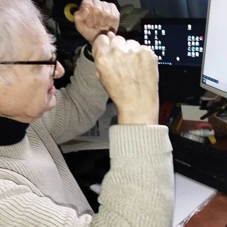 Image shows angry man at computer screen